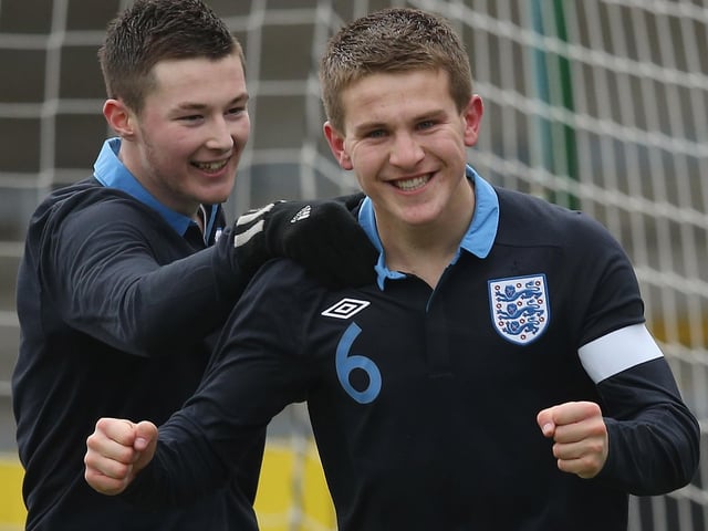 The midfielder couldn't even legally buy a pint here. Morris celebrates scoring for England against Slovenia at the under-17 Euros in 2013.