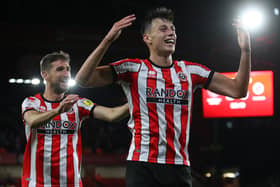 Anel Ahmedhodzic has received help and advice from Sheffield United teammate Chris Basham - and has given it too: Simon Bellis / Sportimage