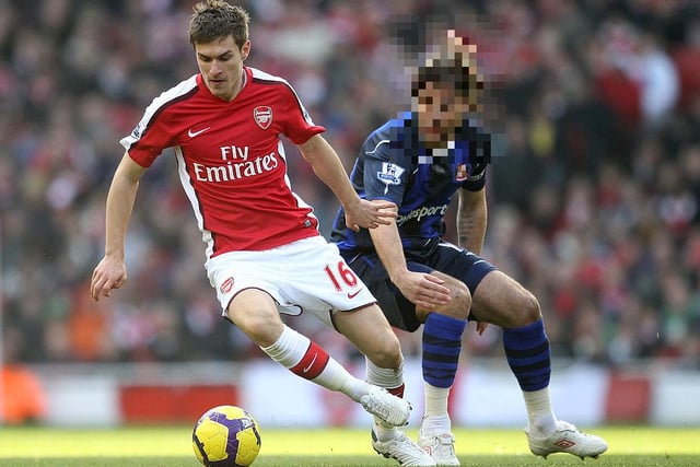 Who is trying to stop Aaron Ramsey?
