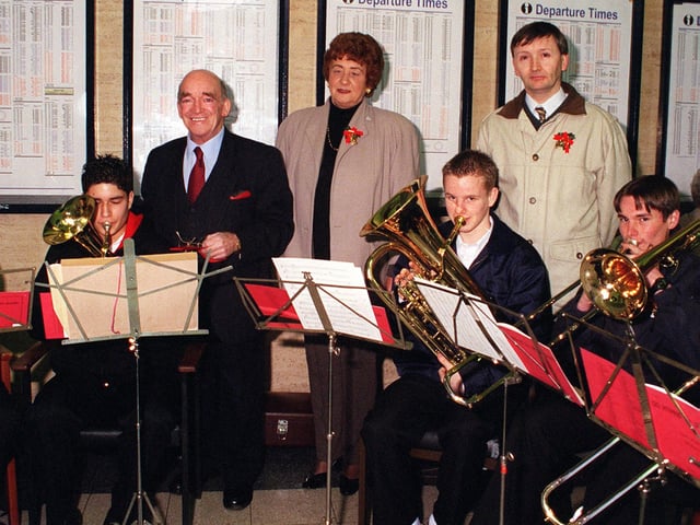 At the switch on of the Christmas Tree lights at Doncaster station members of the senior brass ensemble from the William Appleby Music Centre played carols before the lights were switched on by at rear from left Lord Walker and Dorothy SEdgwick executive member of the St Johns Hospice with right Paul Stubbs conductor back in 1999