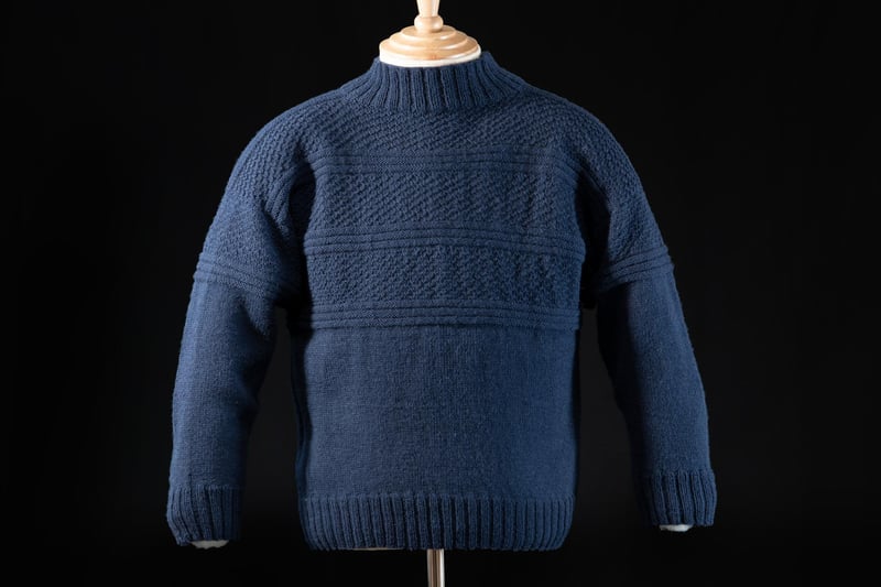 This warm and largely waterproof style of  jumper was popular among fishermen. Created with extraordinary skill, families and communities developed their own patterns and it is said that if a fisherman was washed overboard, he could be identified by the pattern of his gansey.