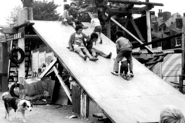 Children having fun at the Pearl Street adventure playground, Sharrow, Sheffield, in the late 1970's 
Picture: submitted by Veronica Taylor