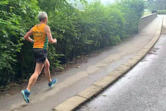 Dot Kesterton nearing the end of her first attempt at Damflask for the victorious British Masters Relays Virtual 5K