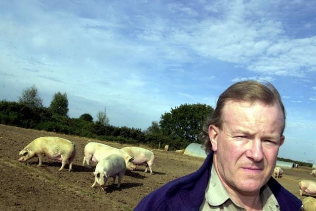 Pig farmer Richard Longthorne, Finningley, 2003.