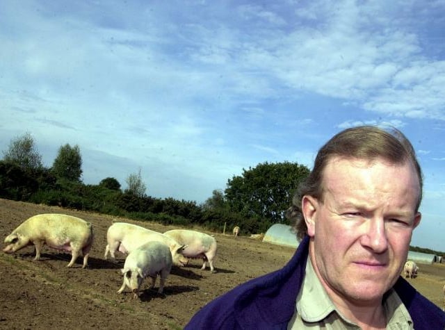 Pig farmer Richard Longthorne, Finningley, 2003.