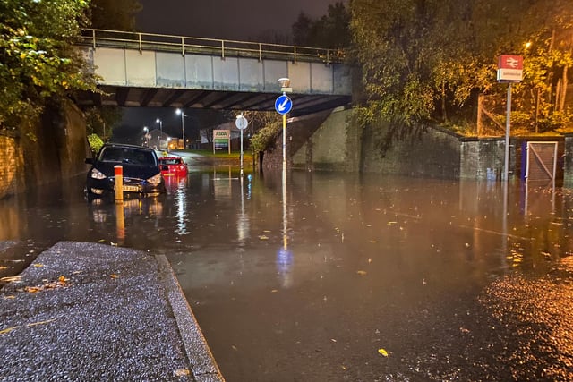 Sandbank Street, next to Summerston train station in Glasgow. This image was taken at 18.53pm on Wednesday and clearly shows cars submerged in water after persistent rainfall.