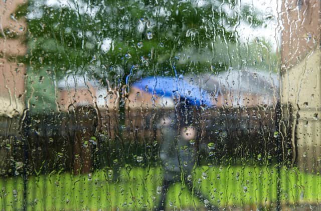 Wet weather in Sheffield. Picture Scott Merrylees
