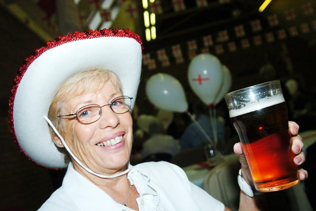Coun Val Jennings enjoys a pint of real ale at St George's Day celebrations at Armthorpe Community Centre, Doncaster