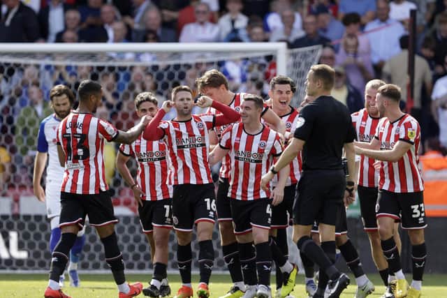 Sheffield United's Oliver Norwood (fourth left) celebrates scoring the opening goal of the game against Blackburn Rovers: Richard Sellers/PA Wire.