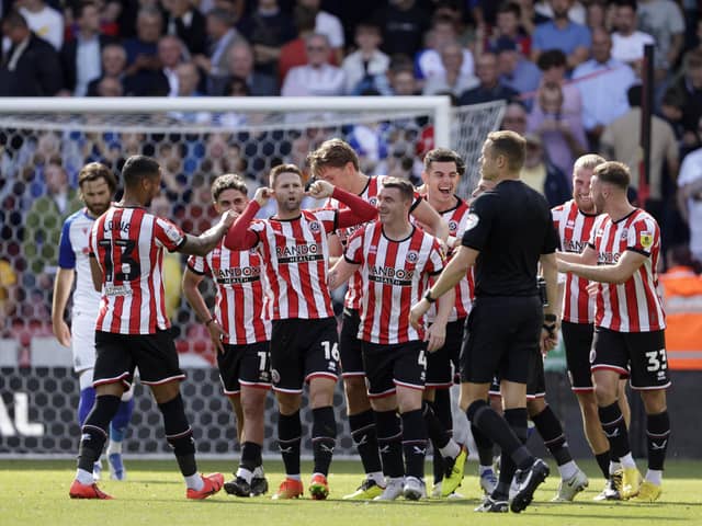 Sheffield United's Oliver Norwood (fourth left) celebrates scoring the opening goal of the game against Blackburn Rovers: Richard Sellers/PA Wire.