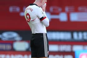 Deflated Oli McBurnie reacts after United's defeat to Manchester City: Simon Bellis/Sportimage