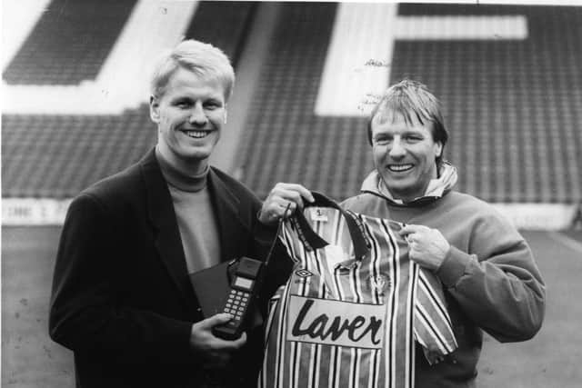 Dave Bassett with new signing Paul Rogers