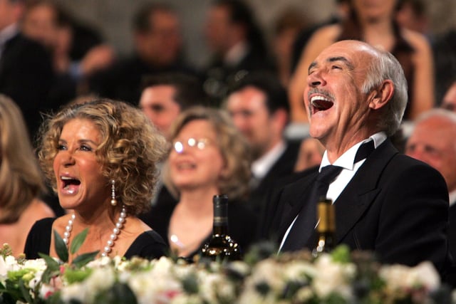 Sean Connery and wife Micheline Roquebrune laugh during the 34th AFI Life Achievement Award tribute to Sir Sean Connery held at the Kodak Theatre on June 8, 2006 in Hollywood, California.  