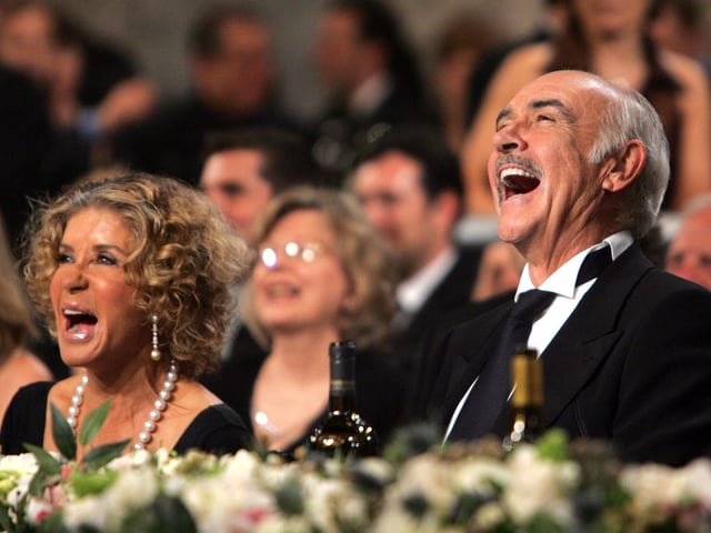 Sean Connery and wife Micheline Roquebrune laugh during the 34th AFI Life Achievement Award tribute to Sir Sean Connery held at the Kodak Theatre on June 8, 2006 in Hollywood, California.  
