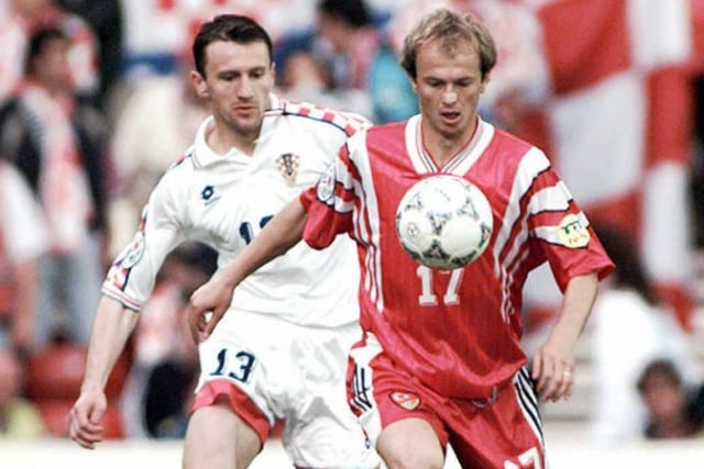 Turkish midfielder Ercan Abudullah(R) blocks Croatian defender Mario Stanic during the Euro 96 match.