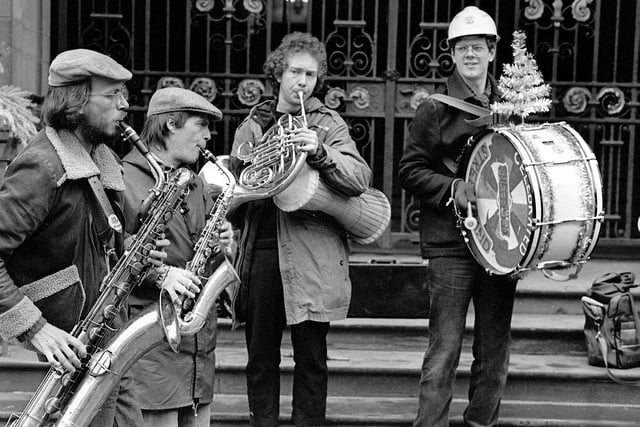 Sheffield Street Band playing on the Sheffield Town Hall steps in aid of the miners fund during the miners strike, December 1984