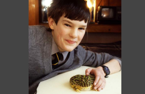 Neill Cook with his pet toad, Caliban in 1988. Neill won the Perky Pet of the month award that year and picked up prizes which included a 35mm camera from Binns.