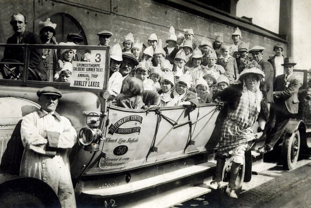 Attercliffe Central Garage provides the transport for a children's day out in the country in the 1920s