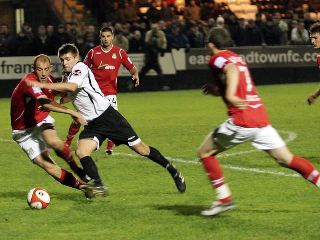 Ian Holmes threatens the Wrexham defence.