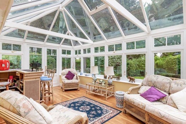 The property's garden room is far more than a conservatory. It is bright, airy and spacious, and offers stunning views.
