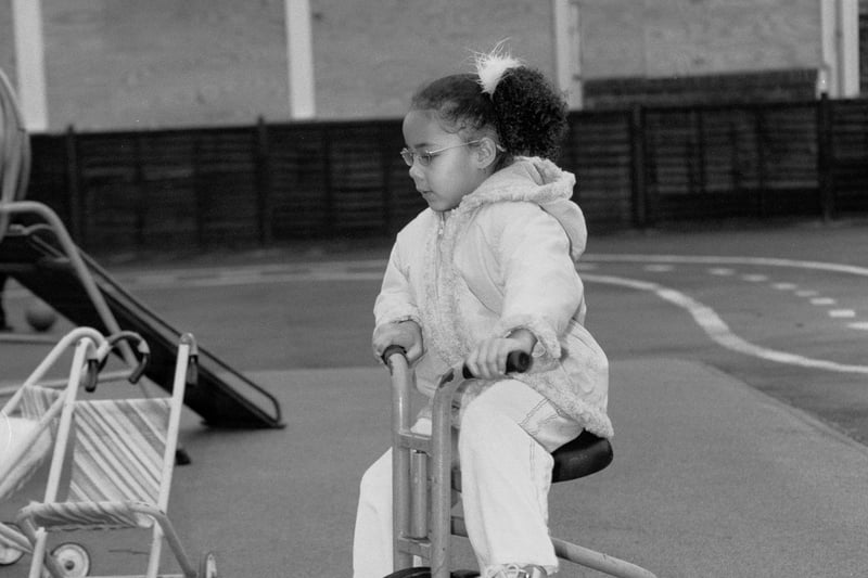 This is playtime at Denby Street Nursery, Highfield, in 2004, where pedal power comes on three wheels.