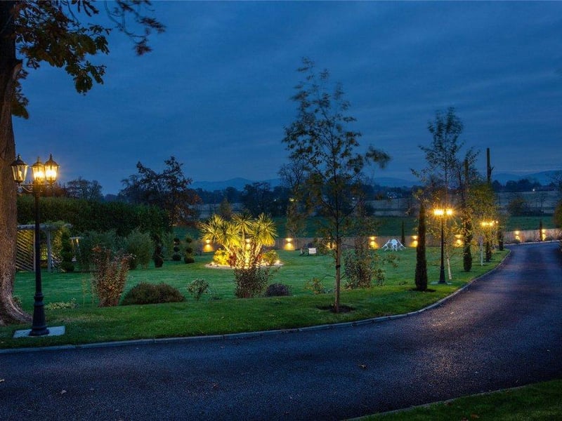 Lighting in driveway and garden.