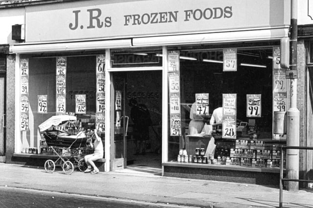 Bacon at 97 pence, pitta bread at 39 pence and ice cream rolls at 28 pence. It is JR's Frozen Foods in 1983.