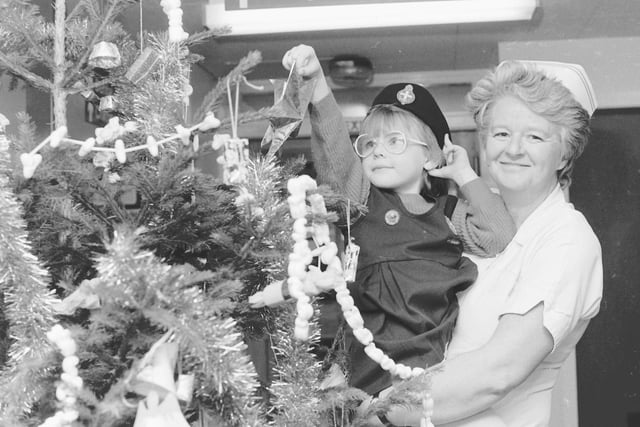 The Girls' Brigade decorate the Gala Health Centre Christmas tree in 1987.