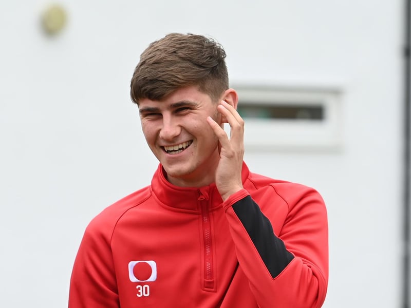 Young defender Ben Blythe shares a laugh with team mates