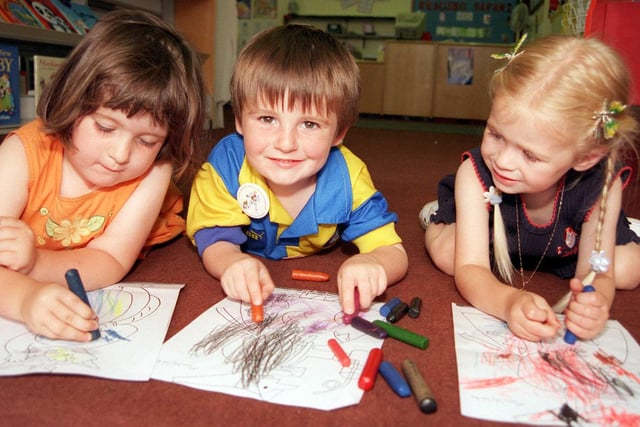 Colouring in pictures at Doncaster Central Library in 1999 were, from left, Charlotte Hicks, aged three, of Kirk Sandall, Joe Malia, aged three, of Bentley, and Olivia De Rosa, aged two, of Bessacarr.