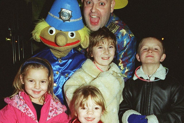 Ventriloquist Naughty Nigel Harvey, appeared as Wishee Washee in the pantomime Aladdin at Doncaster Civic Theatre in 2000 and was pictured with some of the youngsters who attended the lighting up of the street decorations