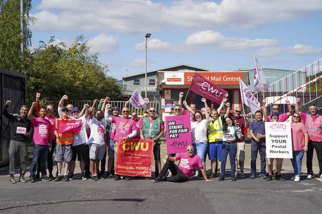 Striking workers on the picket line at Sheffield Mail Centre. Picture Scott Merrylees