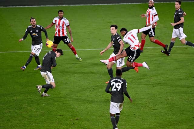 Sheffield United's Lys Mousset (third right) has a shot on goal during the Premier League match at Bramall Lane