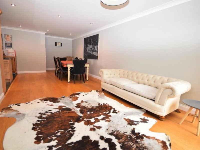 Here is the comfortable living area that is attached to the family kitchen. Ideal for relaxing after your meal.