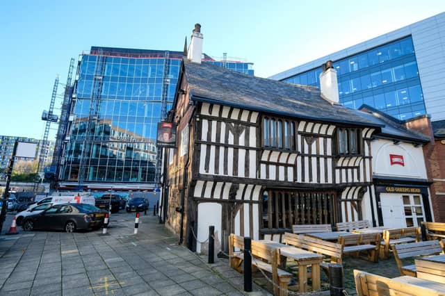 Old Queen's Head, 40 Pond Hill. The only Sheffield pub to be Grade II* listed and the city's oldest residential building. One of the few remaining pieces of medieval Sheffield in the centre of the city. It was built in the late C15th as a hunting and banqueting lodge for the nearby Sheffield Castle. It became a pub in 1841 and is named after a likely visit by Mary Queen of Scots in the 16th century.