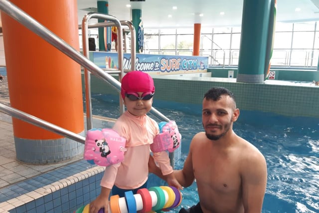 The Surf City leisure swimming pool at Ponds Forge in Sheffield is reopening after a £500,000 refurbishment, having been closed since July 2021. Nasar Meah is pictured with his daughter Samayah, aged four, who he said was 'loving it'
