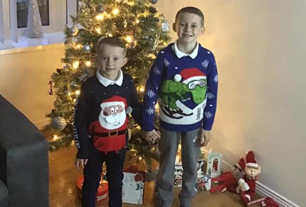 Brennan and Lennon kitted out in their jumpers.