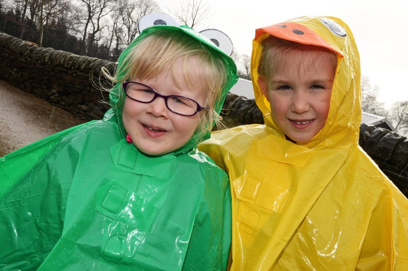 Holly Foster, four and Seren Ord, five, both of Sheffield, wrap up from the cold with complimentary ponchos, handed to children at Whirlow Hall Farm as they enjoy edthe Febuary Farm Fun in 2017