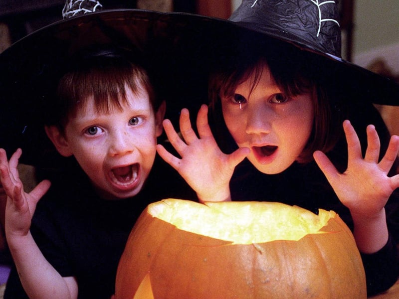 Anna Burgess Haywood (8) and her brother, Michael (4) of Nether Green, Sheffield, get into the spirit of Halloween, in October 1997