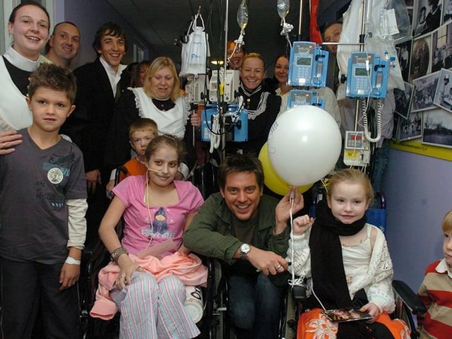 Richard McCourt of Children's BBC's Dick and Dom pictured with patients and staff at Sheffield Children's Hospital, where they were celebrating their 130th anniversary, on November 15, 2006