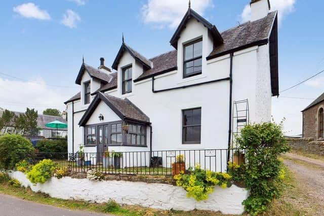 There's little doubt that this beautiful detached family home has lots of kerb appeal and charm.