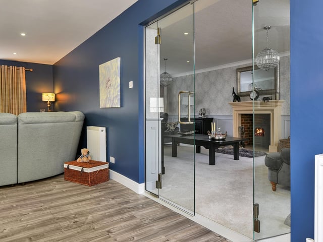 There are glass doors into the lounge.