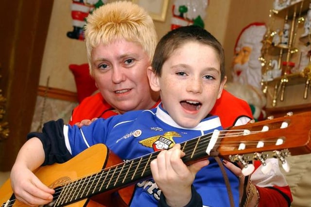 X Factor competitor Sharon Hornsby with her son Dale in Balby, 2004.