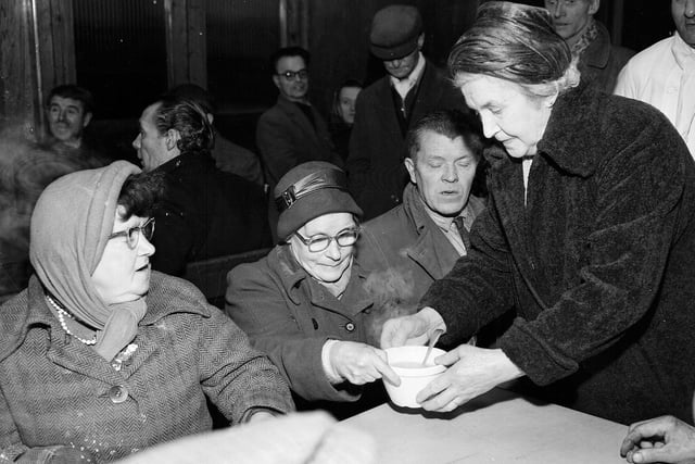 Lady Mathers hands out the first bowl at the Grassmarket Mission's new soup service that opened in January 1963.