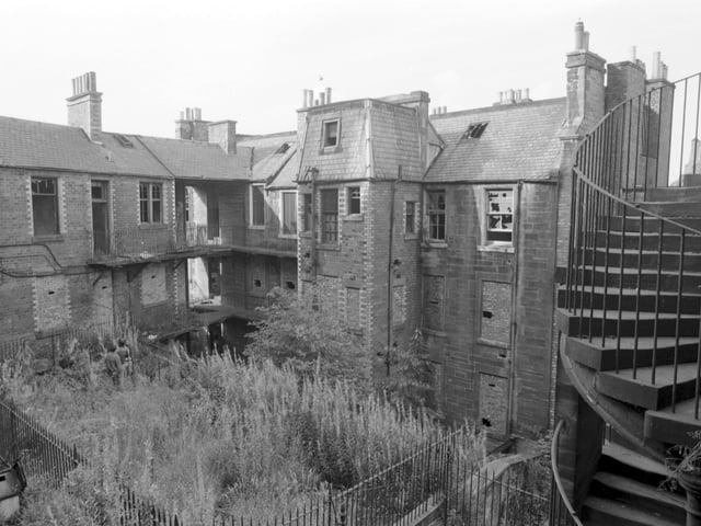 Derelict houses and overgrown gardens behind Edinburgh's West Port in September 1981.