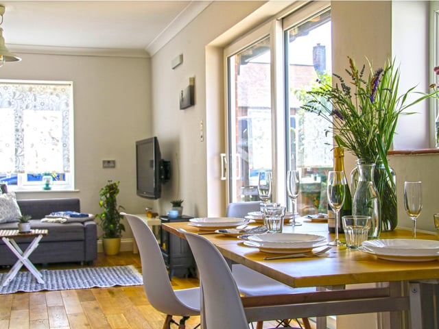 The living and dining area of Sea Mist's three-bedroom bungalow.