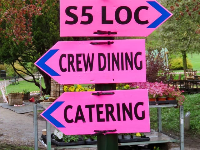 Filming in Sheffield for new HBO miniseries The Regime, starring Kate Winslet and Hugh Grant. A sign directs people to the filming location and catering facilities. Photos by @steelcitysnaps via Twitter