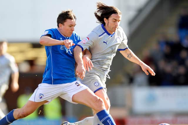 Robertson in action for the Spireites against Sheffield Wednesday.