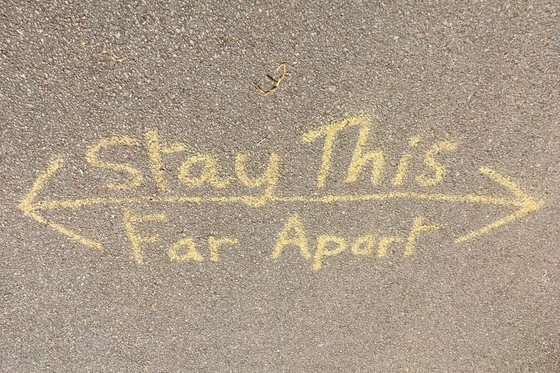 A reminder painted onto a park path.