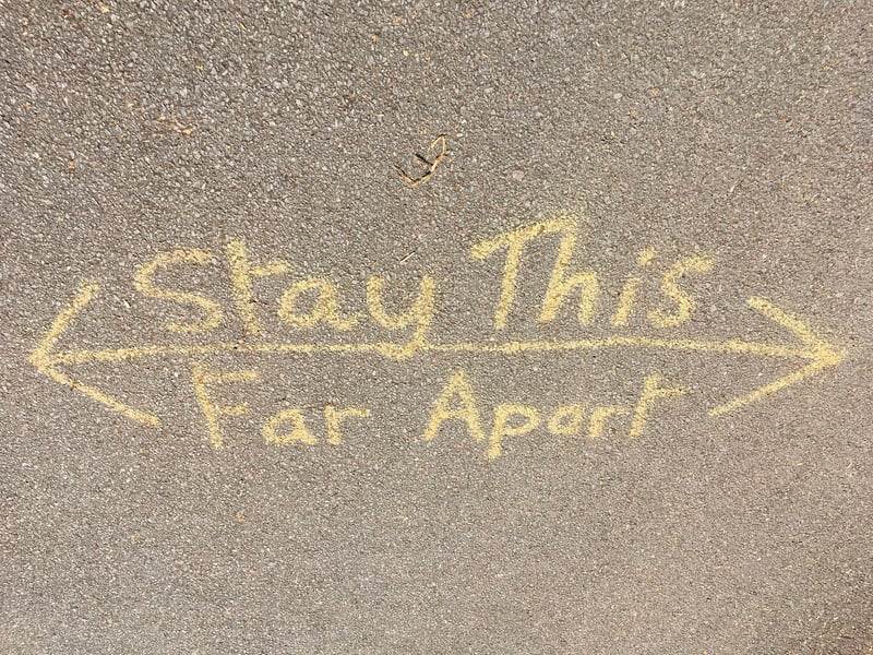 A reminder painted onto a park path.